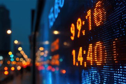stocks-moving-on-earnings-and-deals